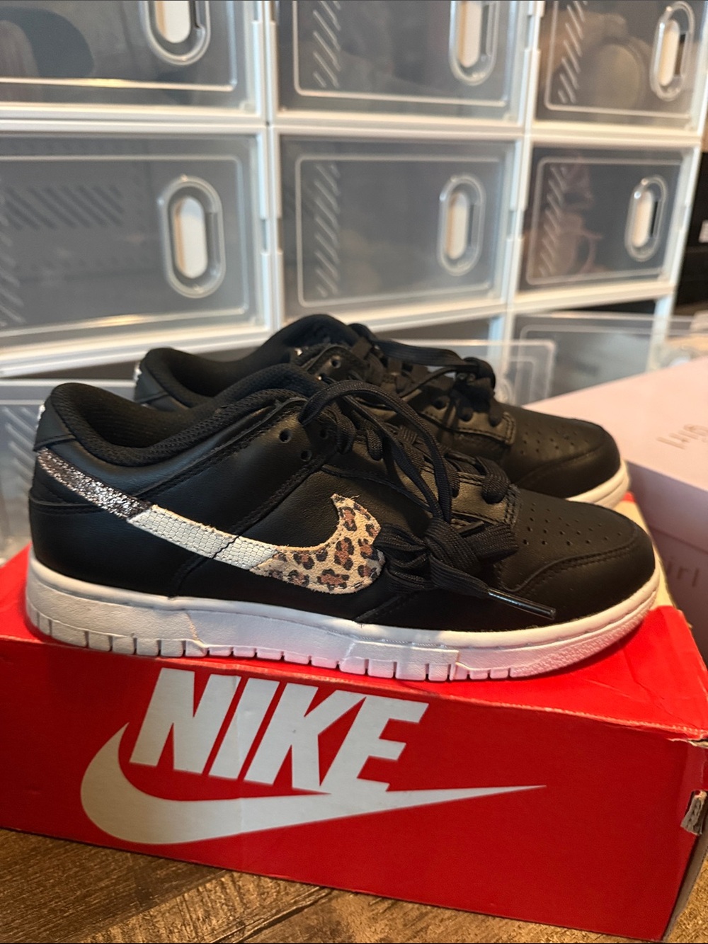 Nike Women’s Black Sneakers with Leopard Swoosh and Silver Accent